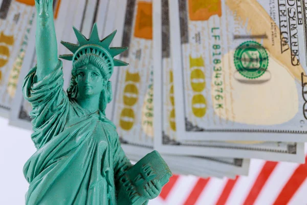 Statue of Liberty on the background money american hundred dollar bills