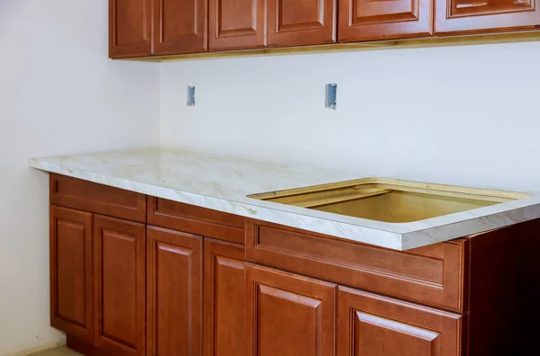 Installing a new laminate kitchen counter top — 스톡 사진