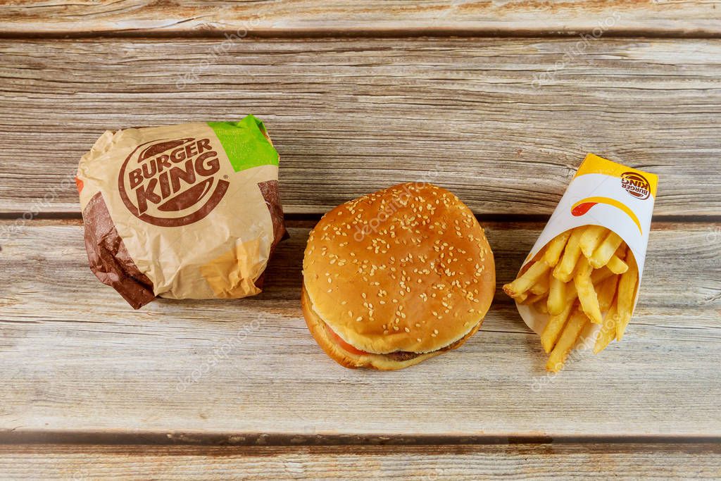 17 January 2020 Chicago IL: Burger king set has hamburger french fries on wooden table