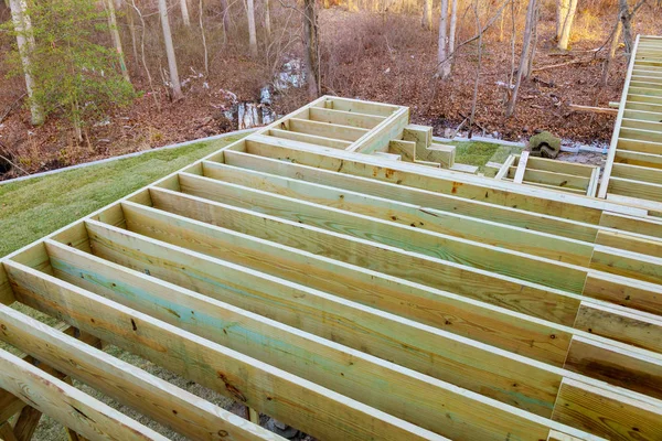 Unfinished installation deck patio construction of flooring by house