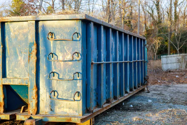 Construction trash dumpsters in an metal container, home house renovation. — Stock Photo, Image