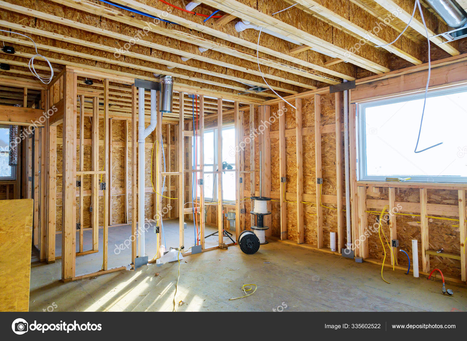 Interior with wood framing beam of new house under construction beam wood Stock Photo by