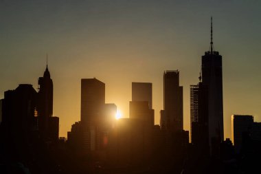 Manhattan sunset with illuminated at dusk in New York City, USA