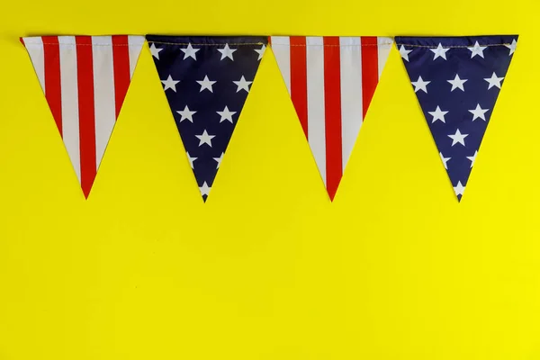 Pennants of stars and stripes flags yellow background american holiday — Stok fotoğraf