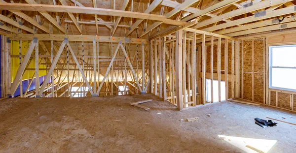 Inside unfinished the attic wooden timber beam of house — Stock Photo, Image