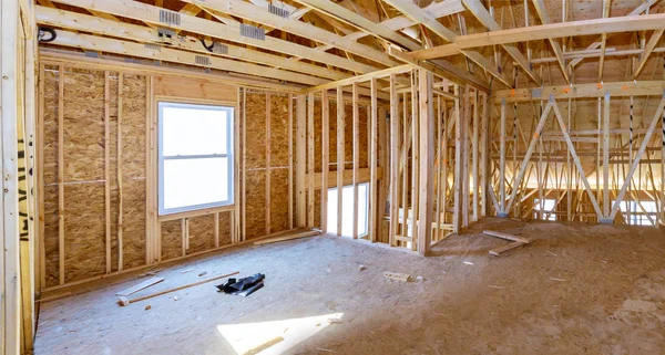 Wooden roof framework on stick built home under construction — 스톡 사진