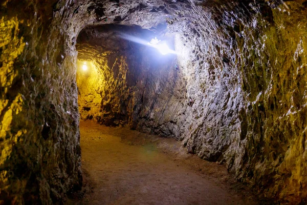 Underground mine passage with light in the tunnel mining industry