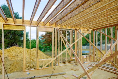 Under construction home framing interior view of a house clipart