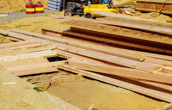 Building materials from a beam construction house framed the ground up