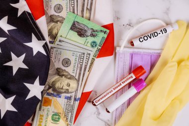 Coronavirus finansal uyarı faturası ABD hükümetinden bireysel çekler Amerikan bayrağı için 100 dolarlık banknotlar küresel salgın Covid 19 tecrit