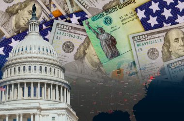 ABD başkenti Washington 'da küresel salgın Coronavirus Covid 19 tecrit, hükümet dolarlarından gelen bireysel uyarı çekleri Amerikan bayrağında