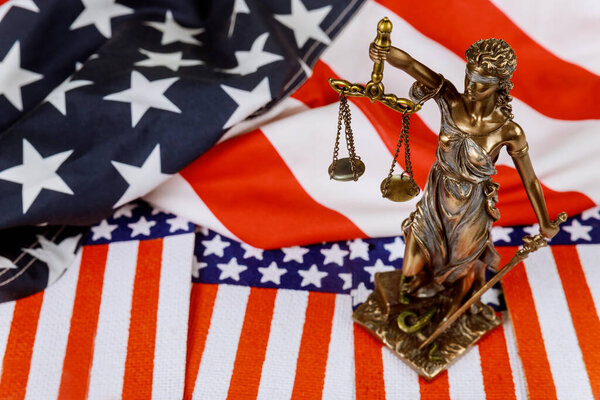 Statue of Lady Justice Scale On Usa Flag in Law and Justice