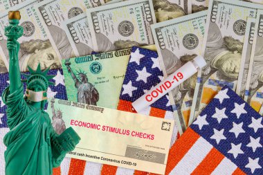 Federal STIMULUS RELIEF PROGRAM Bireysel virüs ekonomik canlandırma planı Amerikan bayrağındaki Amerikan doları nakit banknotu Covid 19 ABD kilitlenmesi