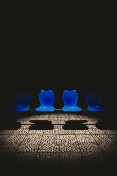 Public chair in the dark. — Stock Photo, Image