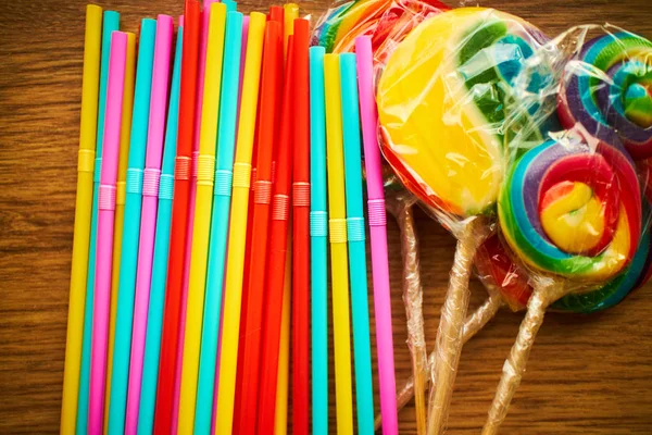 multicolored cocktail sticks and lollipops