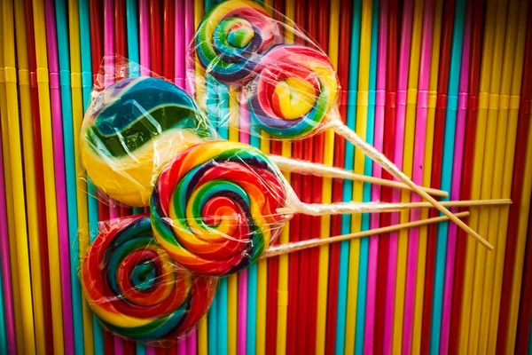 multicolored cocktail sticks and lollipops