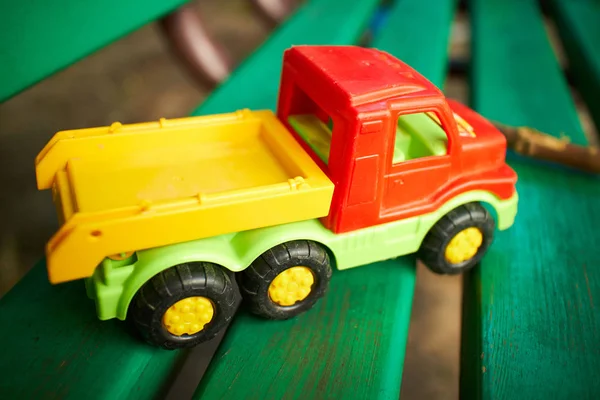 Toy truck on the bench — Stock Photo, Image