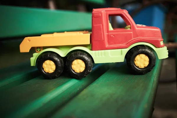 Toy truck on the bench — Stock Photo, Image