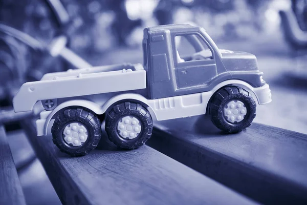 Toy truck on the bench — Stock Photo, Image