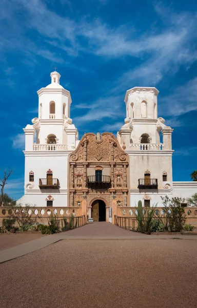 Frontal shot of Mission of San Xavier del Bac in Tucson with church tower and historic entrance