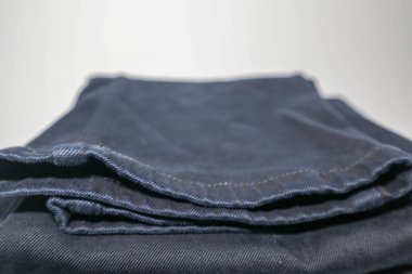 Promosyon ve çamaşırhane geçmişi için kot kumaş ve makroyu kapatın.