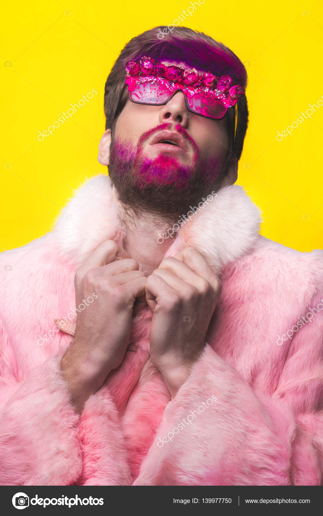 https://st3.depositphotos.com/2955305/13997/i/1600/depositphotos_139977750-stock-photo-man-in-a-pink-fur.jpg