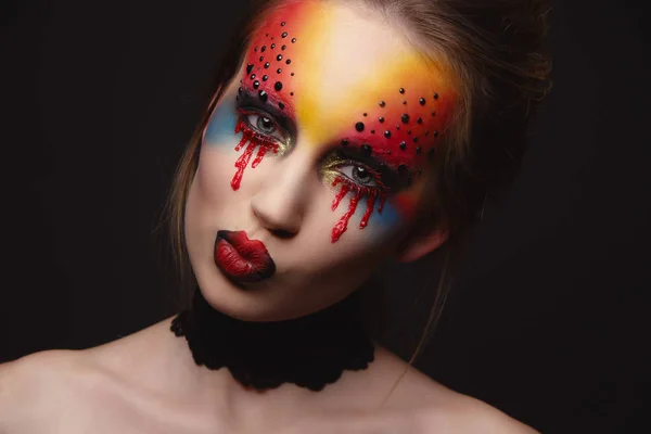 Young female model with bloody eyes makeup — Stock Photo, Image