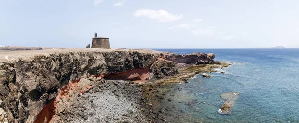 Castillo de las coloradas in playa blanca — Stockfoto