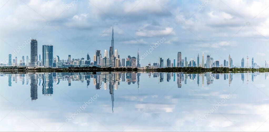Amazing view of Burj Khalifa, World Tallest Tower along with Sheikh Zayed Road, Residential and Business Skyscrapers in Downtown, A view from Dubai creek Harbor.