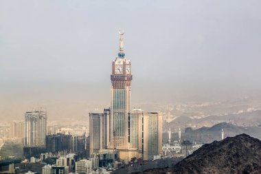 Skyline with Abraj Al Bait (Royal Clock Tower Makkah) in the Holy City of Mecca, Saudi Arabia. Saudi Arabia Skyscrapers clipart