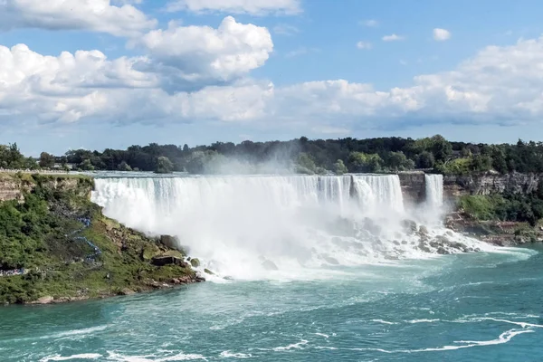 Niagara Falls American Falls on a summer day at the international border between Canada and the USA.