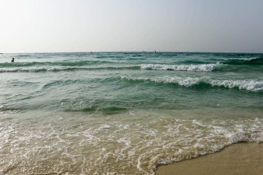 Deniz manzaralı Horizon, Dubai 'de kumlu plaj, Birleşik Arap Emirlikleri