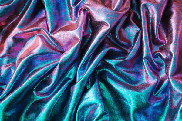 Abstract iriserende holografische textuur gerimpeld materiaal. — Stockfoto