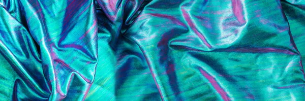 Abstrakte irisierende holographische Textur faltiges Material. — Stockfoto