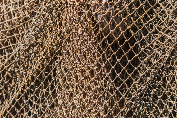 Alte Fischernetze. abstrakter Hintergrund, geometrisches Muster — Stockfoto
