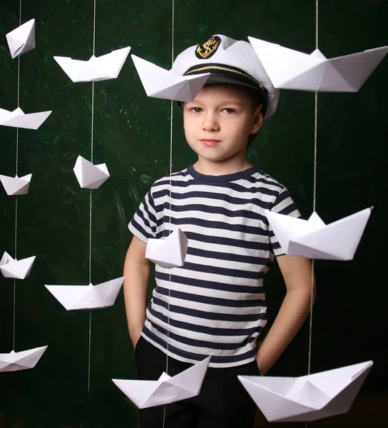 Portrait Confident Boy Sailor Captain Look Hanging Paper Boats Shirt — Stock Photo, Image