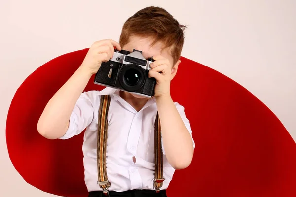 Cute Red Hair Boy Sit Photo Studio Red Chair Film — Stock Photo, Image