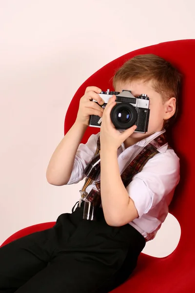 Little Boy Photographer Sit Red Studio Chair Film Vintage Photo — Stock Photo, Image