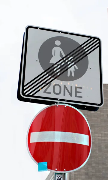 Street sign about finish end of pedestrian zone, image of mother walk with baby, at Europe, Germany