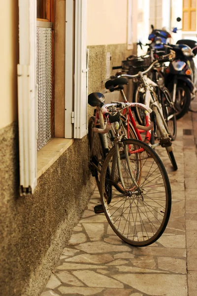 Cosy european street with bicycle and bikes parking, healthy ecologic transport