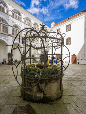 ORMOZ, SLOVENIA - MARCH 5th 2019: The well standing in the courtyard of the Ormoz castle, Slovenia