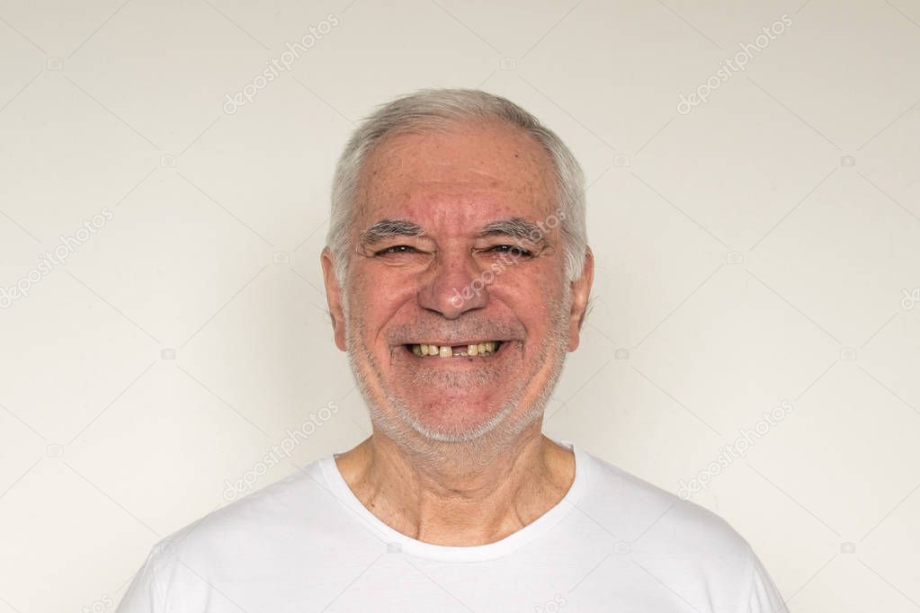 old man senior face closeup missing tooth smile proper tooth care