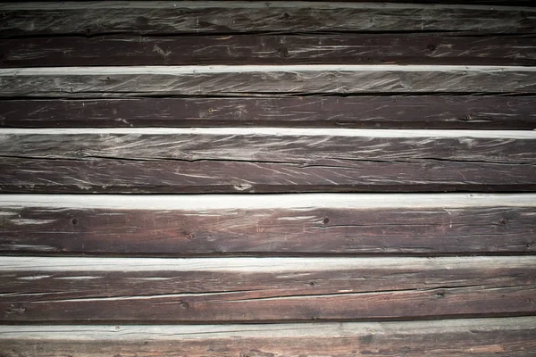 Log texture primo piano sfondo nero rotto scuro — Foto Stock