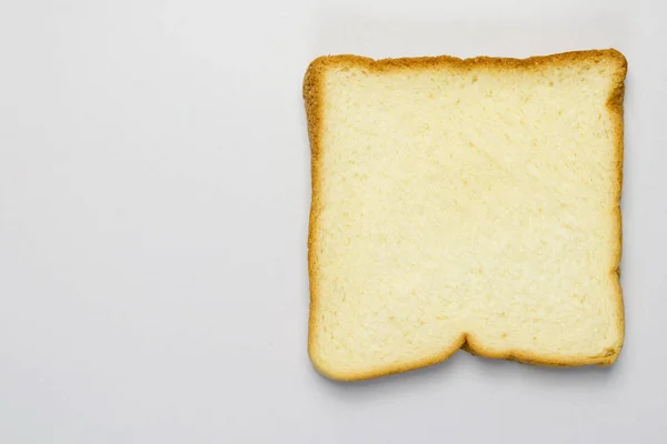 Kawałek chleba izolowany na białym tle — Zdjęcie stockowe