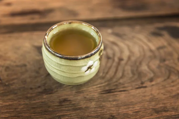 Cup of tea on wooden table — Stock Photo, Image