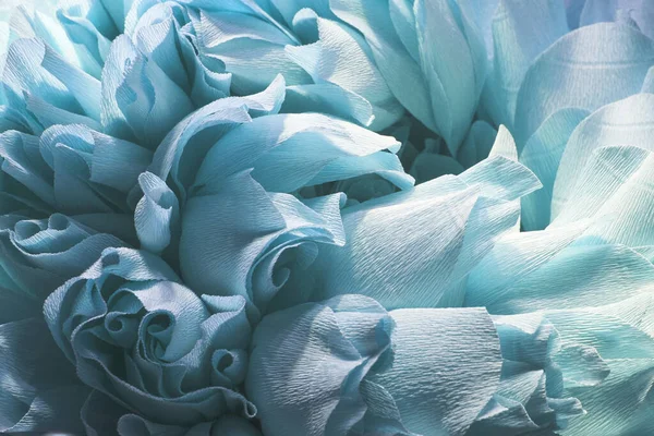 Blue flower texture background. Artifical peony flower petals. Dreamy Abstract pastel floral backdrop. Beautiful blossom, flower waves. Handmade flower. Macro close up, copy space, selective focus