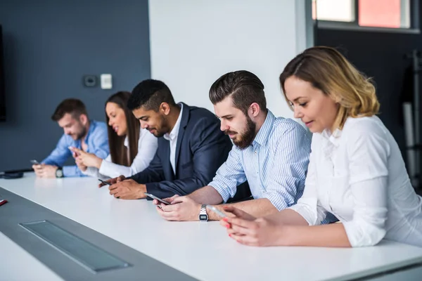 Working on mobile phones — Stock Photo, Image