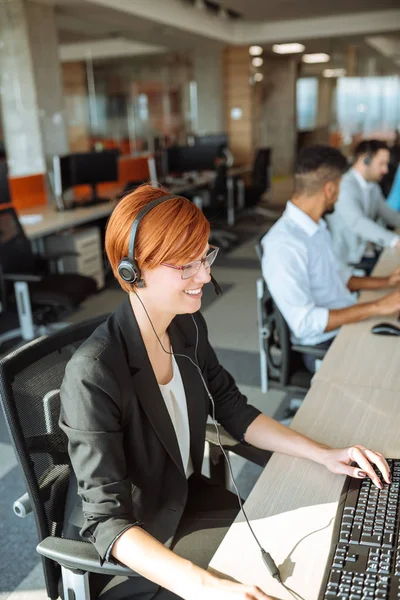 Working in a call centre — Stock Photo, Image