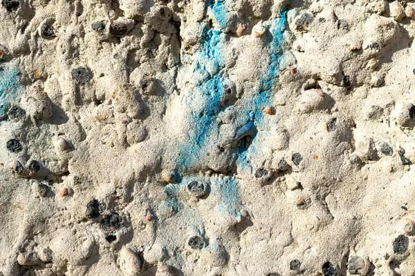 Dışbükey alçı dokusu. Duvarın kabataslak sonu.