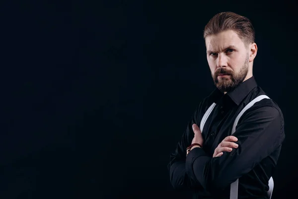 Half-turned Portrait of Masculine Bearded Man in Black Shirt